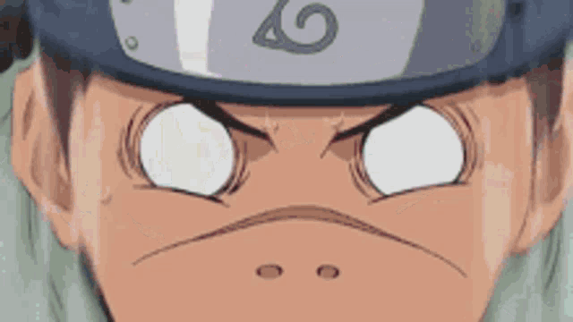 a close up of a cartoon character 's face with white eyes and a helmet .