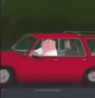 a cartoon character named peter griffin is driving a car .
