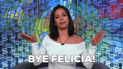 a woman is saying bye felicia in front of a wall of eyes .