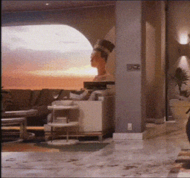 a statue of a woman sits in a living room