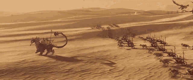 a group of horse drawn carriages in the desert with birds flying overhead
