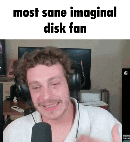 a man wearing headphones is smiling in front of a microphone with the words `` most sane imaging disk fan '' written above him