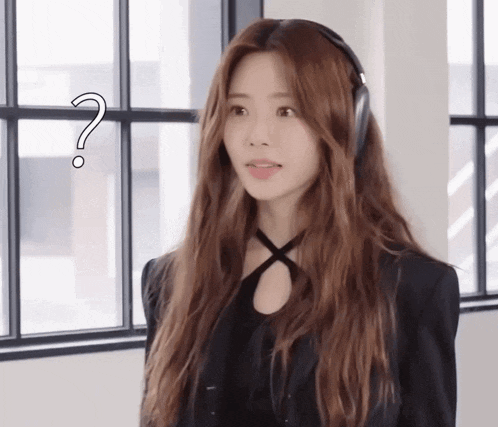 a woman wearing headphones with a question mark above her
