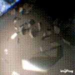 a blurry picture of a person 's face with the words imgplay on the bottom right