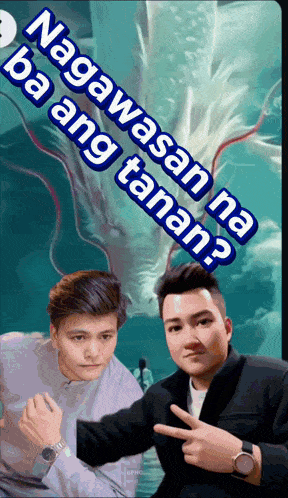 two men are standing next to each other in front of a dragon