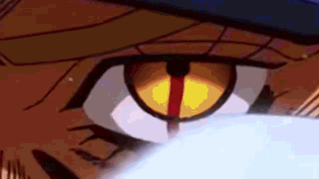 a close up of a cartoon character 's eye with a red stripe on the bottom .