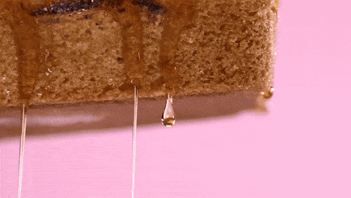 a piece of food with powdered sugar on it