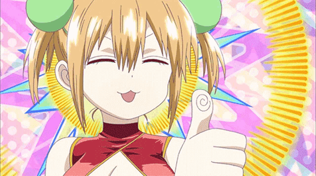 a girl with a green headband is giving a thumbs up sign