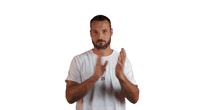 a man wearing a white t-shirt with the number 25 on it