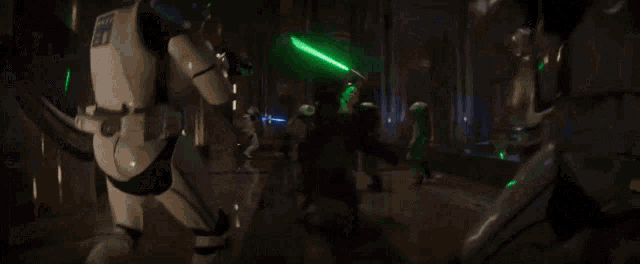 a blurred image of a person shooting a beam of light .