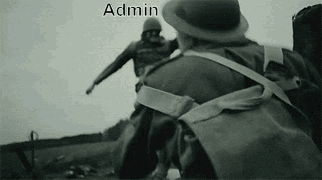 a black and white photo of soldiers with the words admin written on the bottom