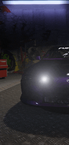 a purple car is parked in a garage with graffiti on the walls