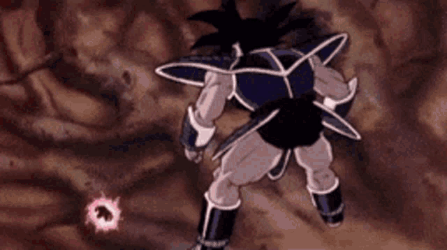a cartoon character is standing on a rocky surface with a purple light coming out of his chest .