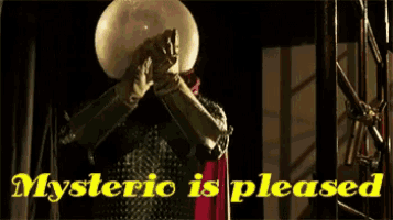 a man covering his face with a crystal ball and the words " mysteric is pleased " below him