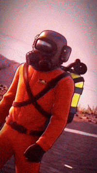a man in an orange suit with a gas mask on his head