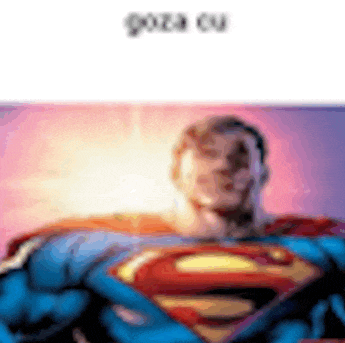 a blurry picture of a man dressed as superman