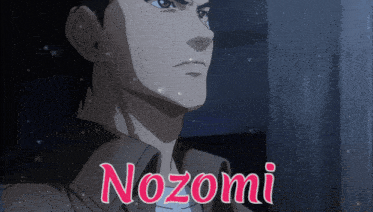 a man with the name nozomi written on his shirt