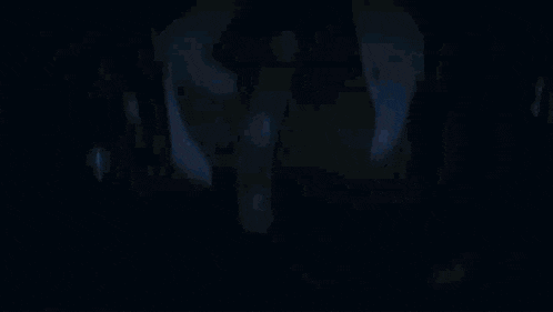 a close up of a girl 's face with her eyes closed