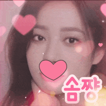 a close up of a woman 's face with a pink heart in her mouth