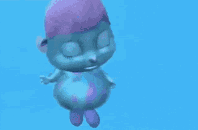 a cartoon character is floating in the air with its eyes closed and a pink hat on .