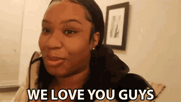 a woman says " we love you guys " while looking at the camera