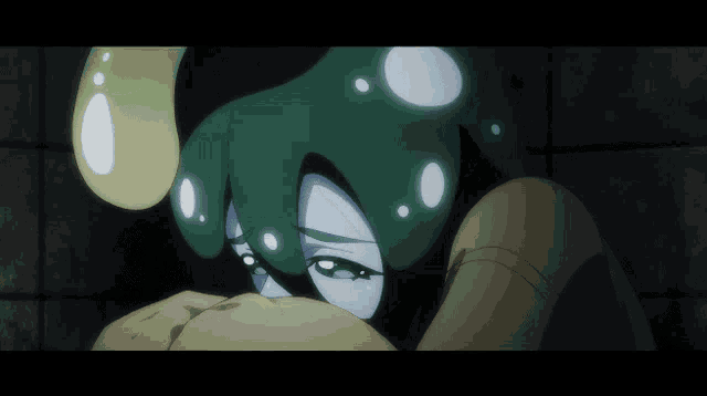 a close up of a cartoon character with a green head and blue eyes