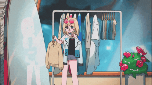a girl is standing in front of a rack of clothing