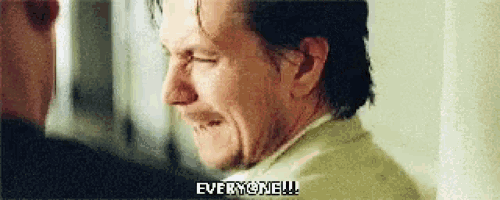 a man is talking to another man and saying `` everyone ! ''