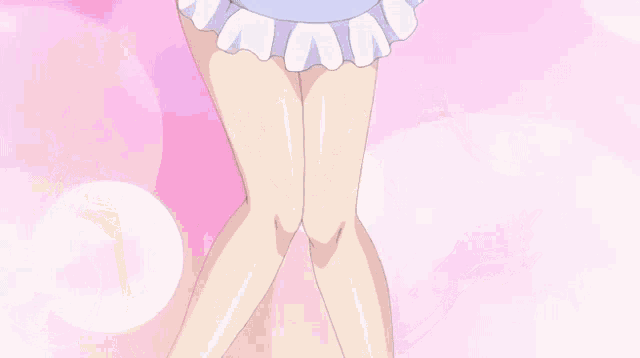 a girl with pigtails is wearing a heart shaped apron .