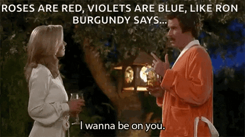 a man in an orange robe is talking to a woman in a white dress while holding a glass of wine .