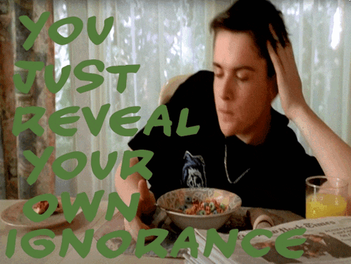 a man sitting at a table with a bowl of cereal and the words " you just reveal your own ignorance " on the bottom