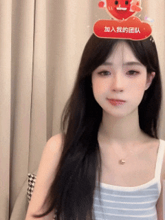 a young woman wearing a hat with chinese characters on it