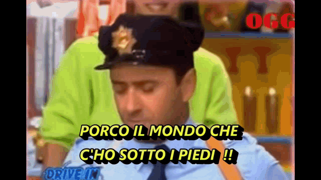 a man in a police hat says porco il mondo che cho sotto i pedi