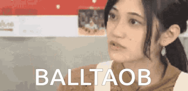a woman with the word balltaob written on the bottom