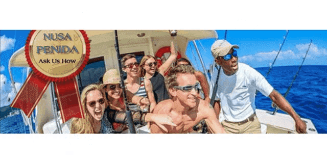 a group of people on a boat that says nusa penida