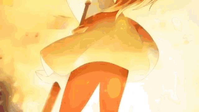 a person is standing in front of a fire holding a sword .