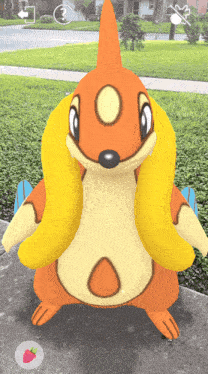an orange and yellow cartoon character with a yellow tail