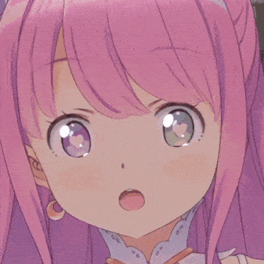 a close up of a pink anime girl 's face