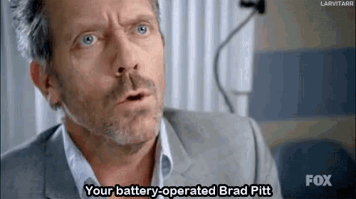 a man in a suit is talking about brad pitt 's battery