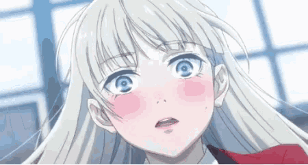 a close up of a blonde anime girl with blue eyes and a red jacket .