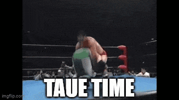 two men are wrestling in a ring and the words taue time are on the screen