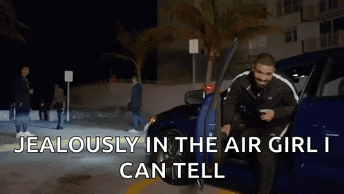 a man is getting out of a car with the words jealously in the air girl can tell