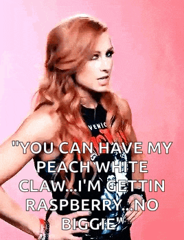 a woman with red hair is standing in front of a pink background with her hands on her hips and a quote .