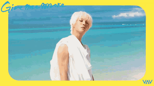 a picture of a man on the beach with the words give me more written on it