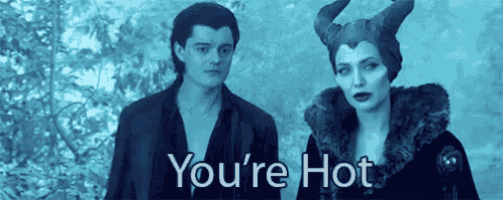 a man and a woman are standing next to each other with the words " you 're hot " written on the bottom