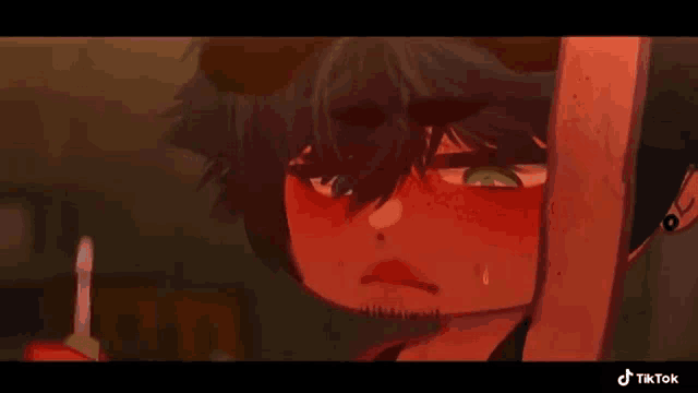 a cartoon character with red skin is holding a knife in his hand .