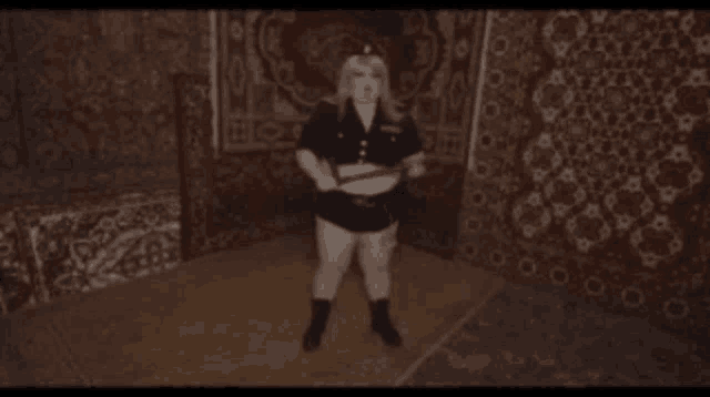 a woman in a police uniform is standing on a rug in a room holding a sword .