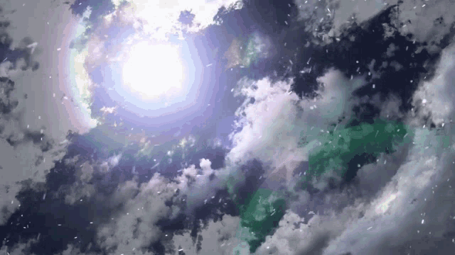 the sun is shining through the clouds with a rainbow in the sky