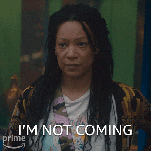 a woman with dreadlocks says " i 'm not coming " on a screen