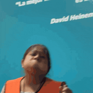 a blurry picture of a woman making a face
